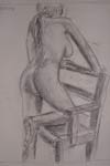 Charcoal life drawing of woman kneeling on chair